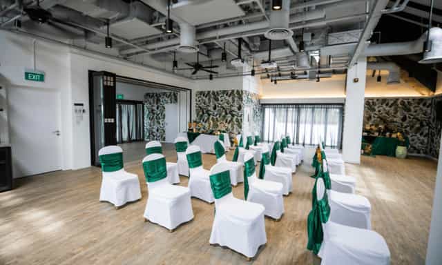 The Elizabeth Suite event space with industrial ceilings, perfect for weddings or conferences.
