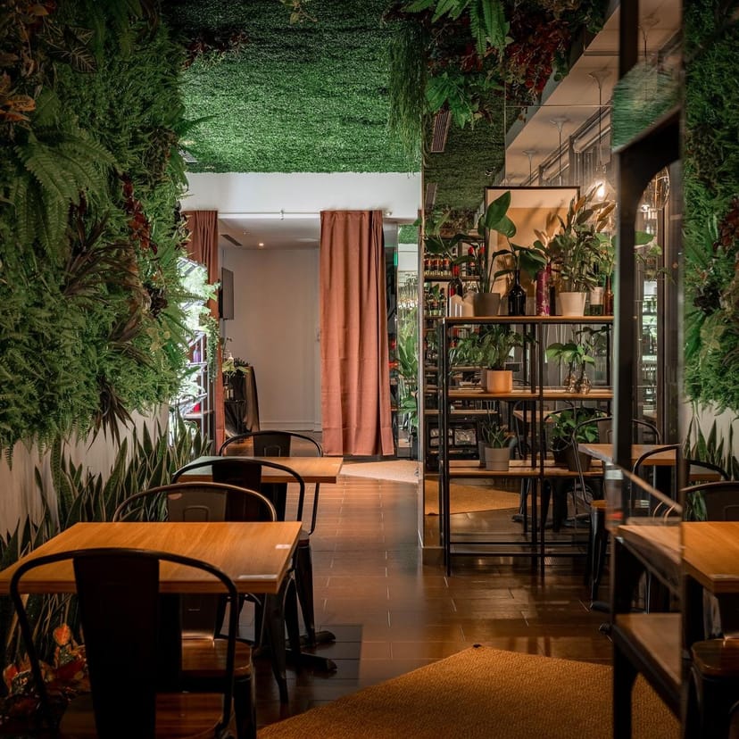 Biophilic breakout space at Studio M Hotel for networking and corporate brainstorming events.