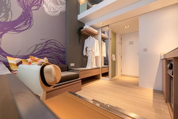 Modern hotel meeting room with minimalist loft design for executive retreats and boutique events.