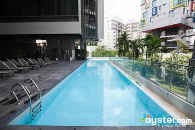 Modern lap pool at Studio M Hotel, ideal for wellness retreats and corporate networking events.