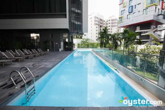 Modern lap pool at Studio M Hotel, ideal for wellness retreats and corporate networking events.