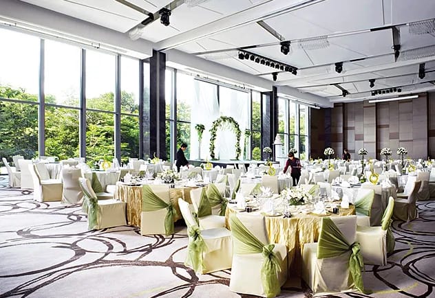 Modern Grand Ballroom with floor-to-ceiling windows for corporate galas and wedding receptions.