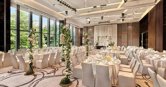 Sky Ballroom with floor-to-ceiling windows, ideal for upscale weddings and corporate gala events.