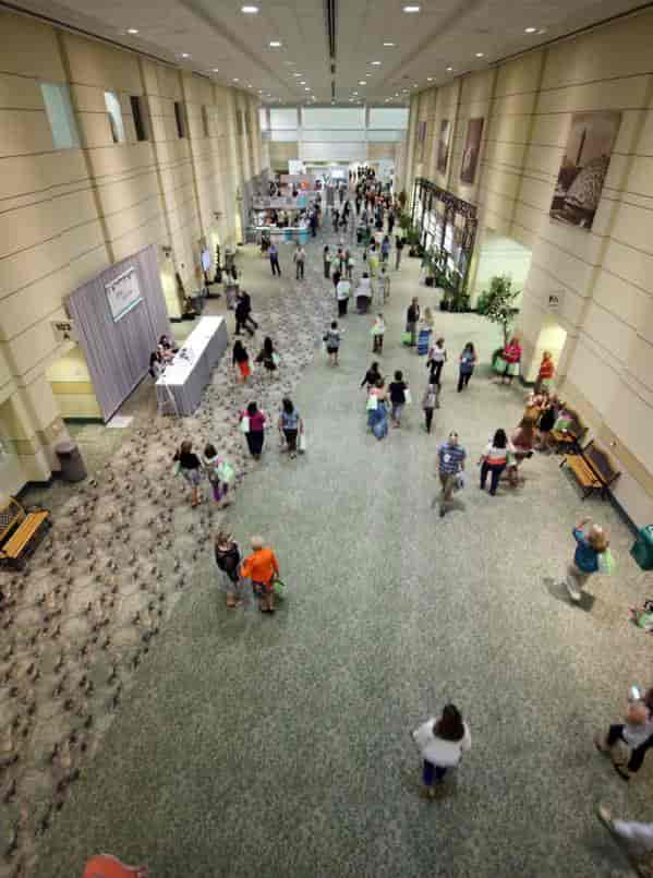 Fort Worth Convention Center exhibit hall with registration desk for trade show and expo events.
