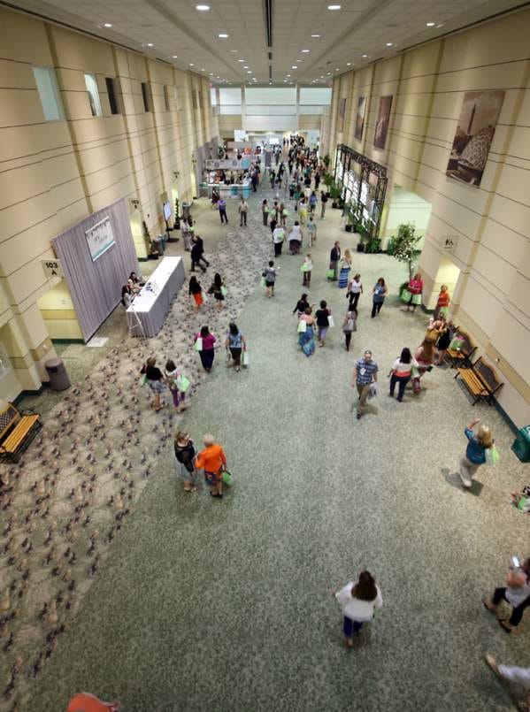 Fort Worth Convention Center exhibit hall with registration desk for trade show and expo events.