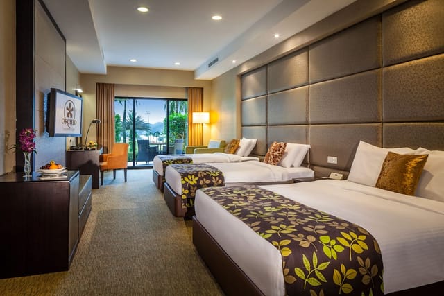 Emerald Suite triple-occupancy room for group travel and corporate event accommodation.