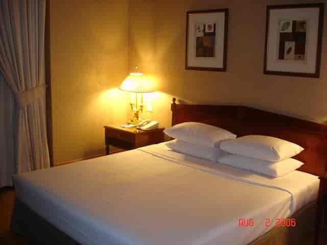Mahogany Room at Raffles Town Club: dated conference venue requiring renovation for events.