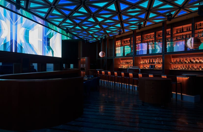 The Hideout High House: Sophisticated VIP reception venue with expansive bar for networking events.
