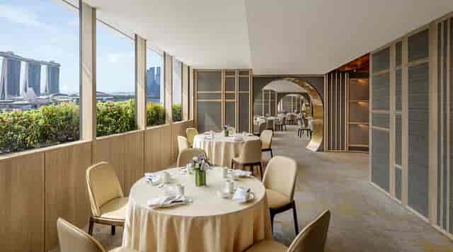Blossom Restaurant private room with Marina Bay view for executive luncheons and VIP networking.