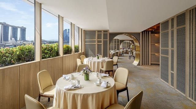 Blossom Restaurant private room with Marina Bay view for executive luncheons and VIP networking.