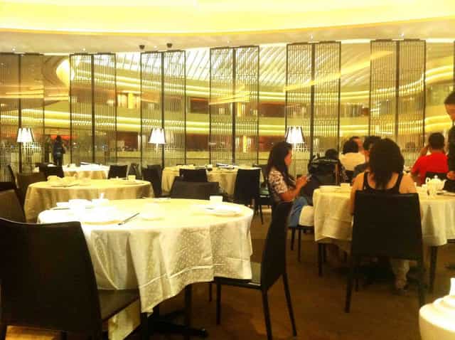 Elegant Imperial Treasure dining room with privacy screens for corporate events and galas.