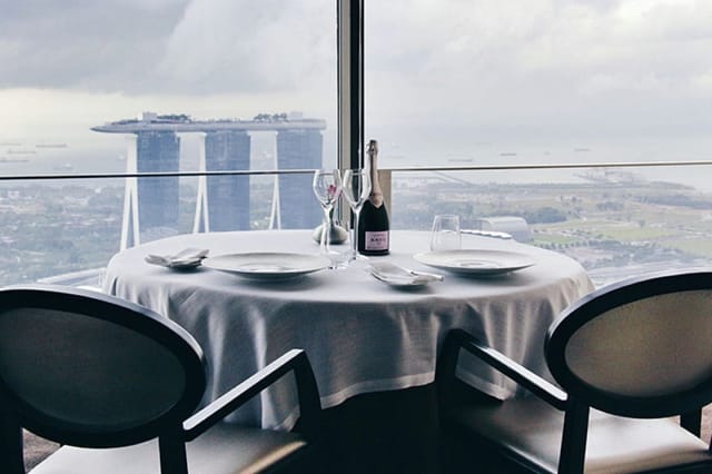 VIP private dining room at JAAN by Kirk Westaway with iconic city skyline views for luxury events.