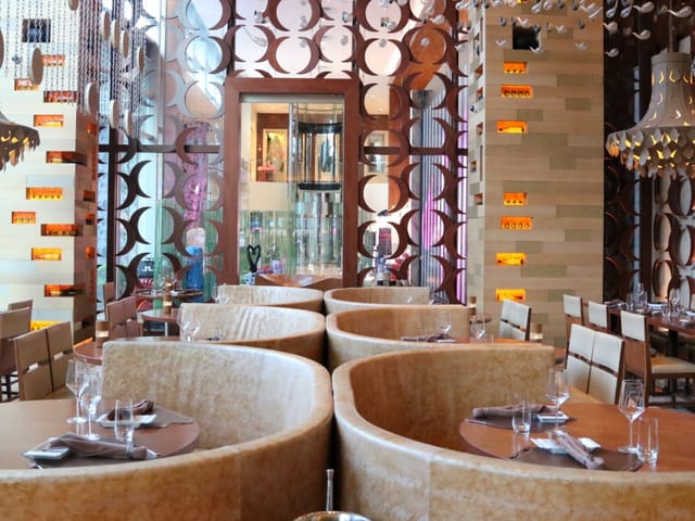 SKIRT restaurant semi-private circular booth for executive lunch and networking dinner.