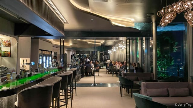 Contemporary rooftop bar in Kaarla with lounge seating for upscale corporate networking events.