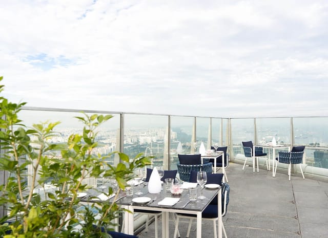 Stellar Restaurant rooftop venue with modern seating for VIP dinners and corporate networking.