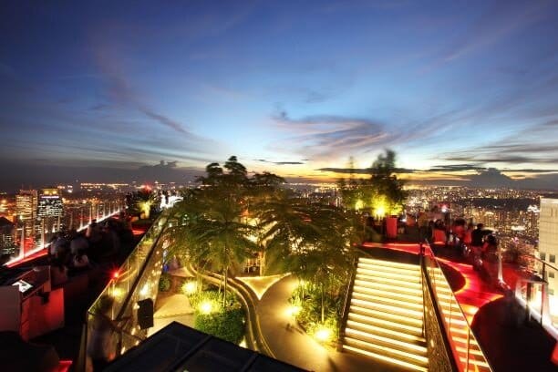 Rooftop Gallery & Bar 1-Altitude: Scenic evening event venue with stunning city skyline views.
