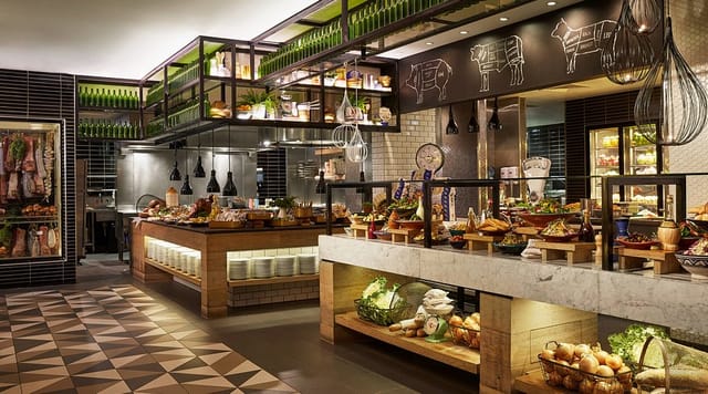 Bazaar Restaurant QT Queenstown buffet station for corporate events and luxury dining.