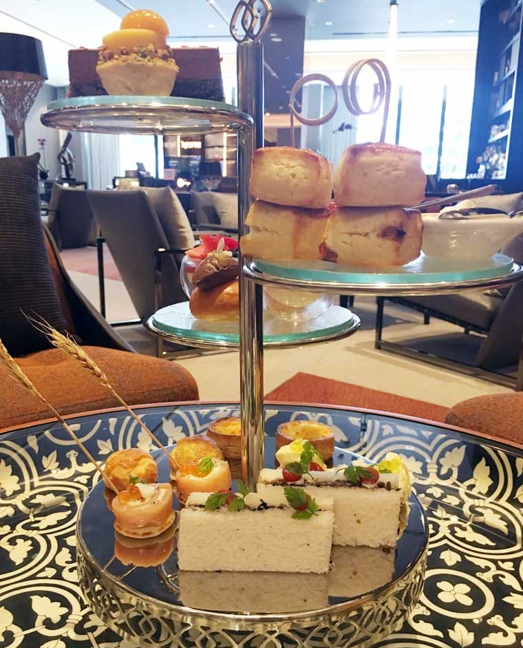 Luxury 1864 tea lounge with tiered displays for VIP networking and corporate hospitality events.
