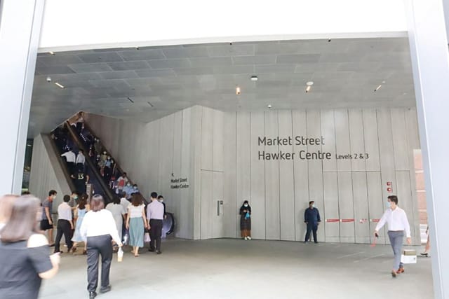 CapitaSpring Hawker Centre: High-traffic entry point for efficient event crowd management.