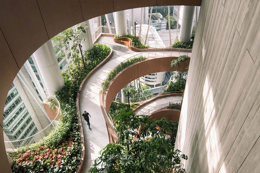 Green Oasis at CapitaSpring: Biophilic architectural space for corporate events and networking.