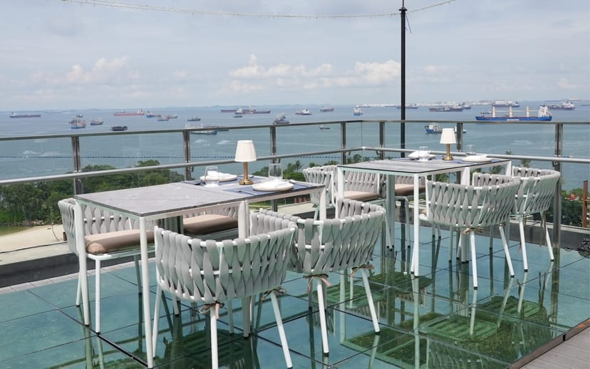 1-Altitude Coast rooftop bar with glass floor for executive dinners and networking events.