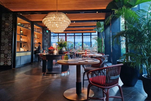 Sophisticated rooftop hospitality space for VIP networking and executive luncheons.