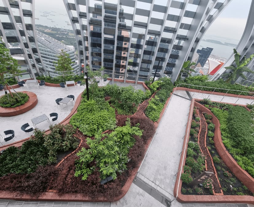 Oumi rooftop garden venue with tiered seating for premium networking and corporate events.