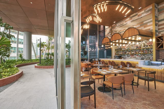 Sophisticated Sol & Luna indoor-outdoor bar venue for corporate cocktail and networking events.