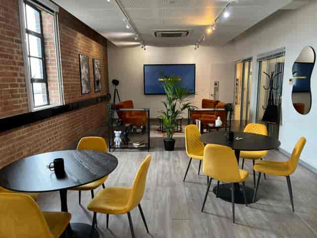 Creators House industrial co-working space for creative workshops and team meetings.