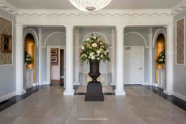 Elegant Arrival Hall in Old Palace Chester, featuring grand columns for upscale events.
