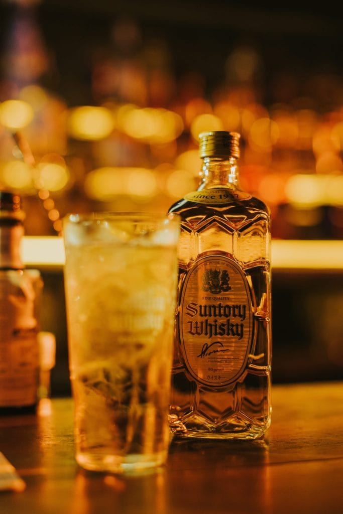 Highball cocktail in white shades for upscale cocktail reception or evening networking event.