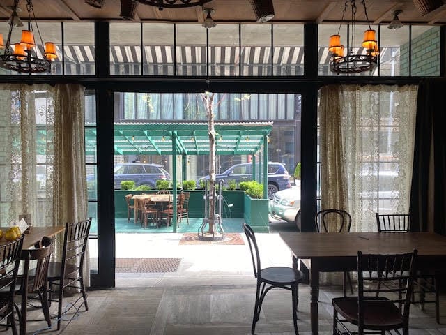 Wine Room at Gemma Bowery Hotel with indoor-outdoor layout, ideal for private events and meetings.