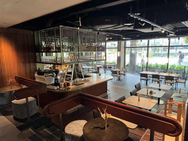 Modern venue space with integrated bar for networking mixers and corporate events.