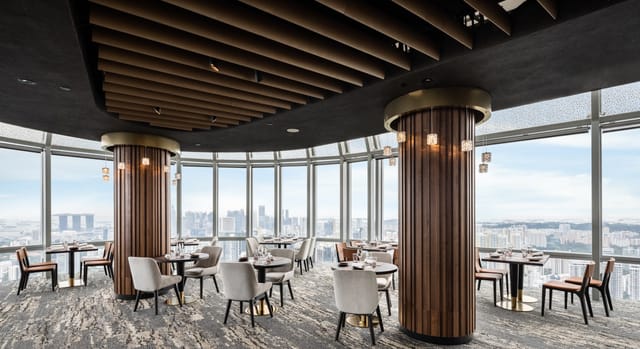 FIRE at 1-Atico circular dining venue for exclusive corporate dinner and networking events.
