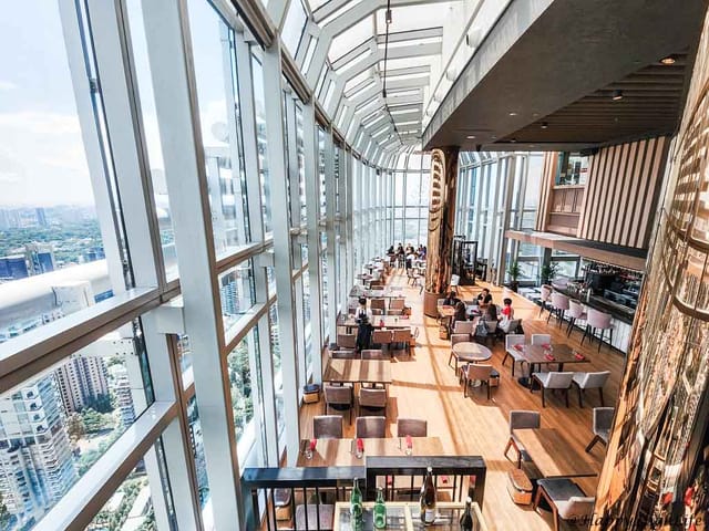 Luxury rooftop venue at 1-Atico with city views, ideal for corporate events and networking.
