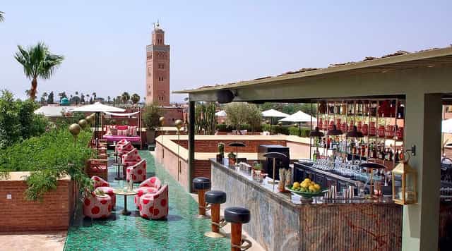 Rooftop venue at El Fenn, Marrakech with Koutoubia Mosque view for VIP reception and event.