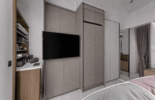 Modern hotel room with minimalist workspace for solo business travel.