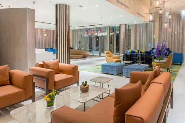 Modern meeting room at Radisson Blu Jeddah with modular seating for corporate events and networking.