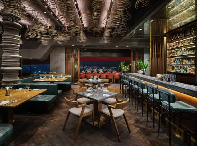 Private dining room at CÉ LA VI Singapore, ideal for corporate events and gatherings.