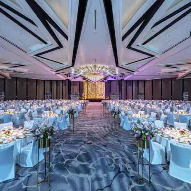 Elegant Stamford Ballroom set for weddings and corporate galas with floral centerpieces.