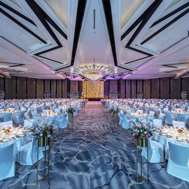 Elegant Stamford Ballroom set for weddings and corporate galas with floral centerpieces.
