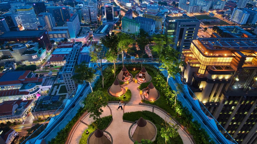 Rooftop bar in Andaz Singapore with lush greenery, ideal for networking events and receptions.