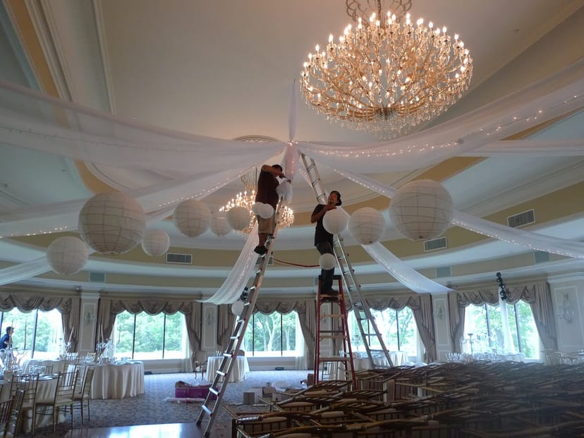 Custom ceiling installation in Oheka Castle Terrace Room for luxury wedding event decor.