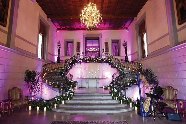 Oheka Castle grand staircase foyer for luxury wedding ceremony and gala reception.