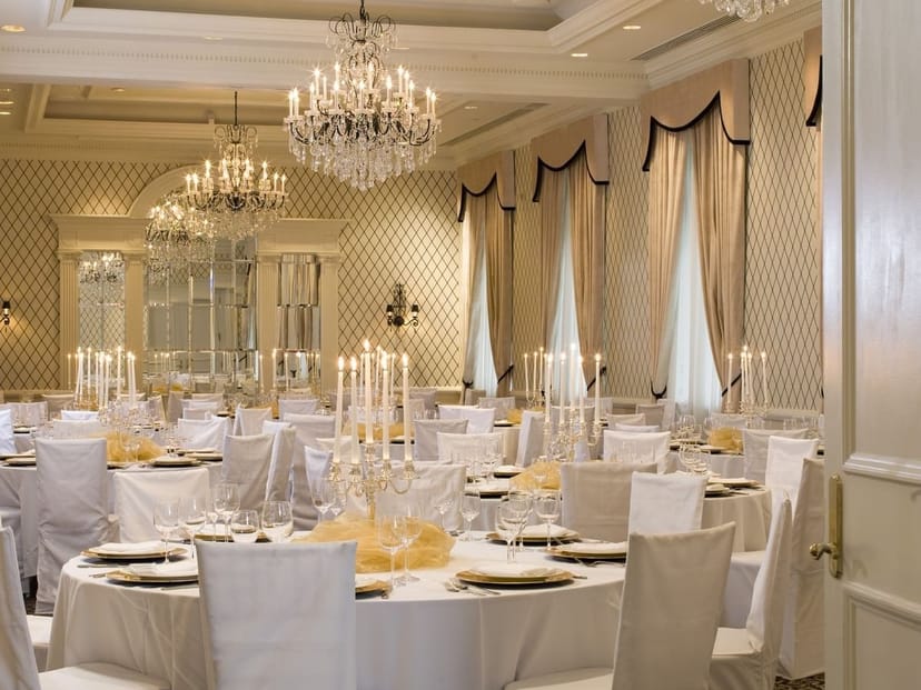 Elegant ballroom with chandeliers for luxury wedding or gala event venue.