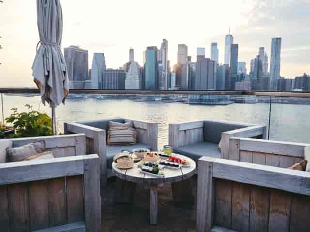 Saltgrass rooftop lounge with Manhattan skyline view for VIP networking and corporate cocktail events.