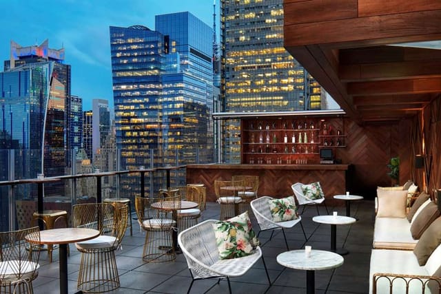 DoubleTree NYC rooftop meeting room with skyline view for corporate networking and mixers.