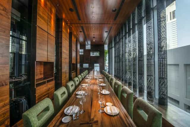 Long-table private dining at Wabi Sabi Zuma Dubai for executive dinners and boardroom meetings.