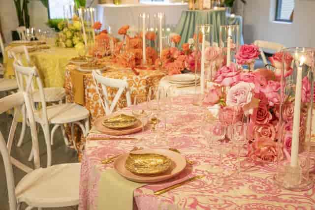 Luxury boutique wedding tablescape with warm, monochromatic linens at ILA Penthouse.