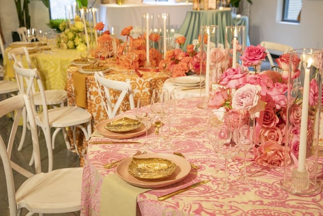 Luxury boutique wedding tablescape with warm, monochromatic linens at ILA Penthouse.